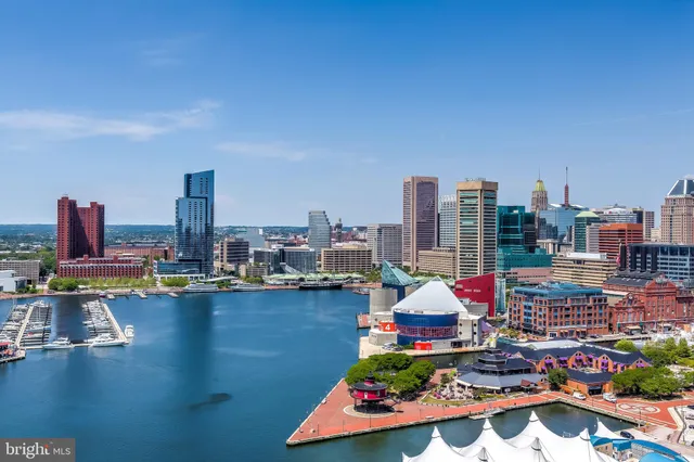 a view of a city with tall buildings