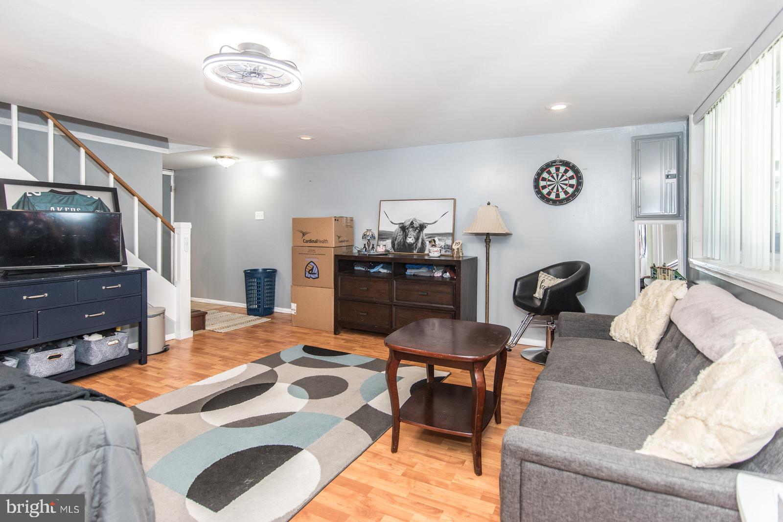 1216 Jennifer Road Philadelphia, PA 19116 - Photo 49 of 77 a living room with furniture and a flat screen tv