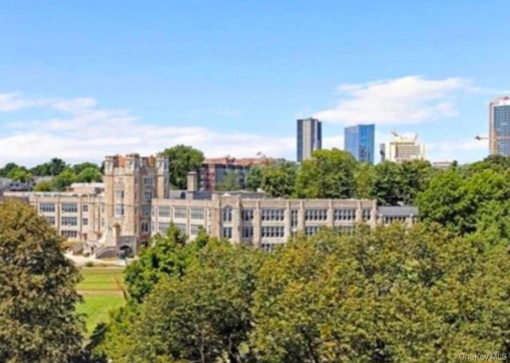 210 Pelham Road, Unit 5P New Rochelle, NY 10805 - Photo 22 of 25 a view of a lake with a city