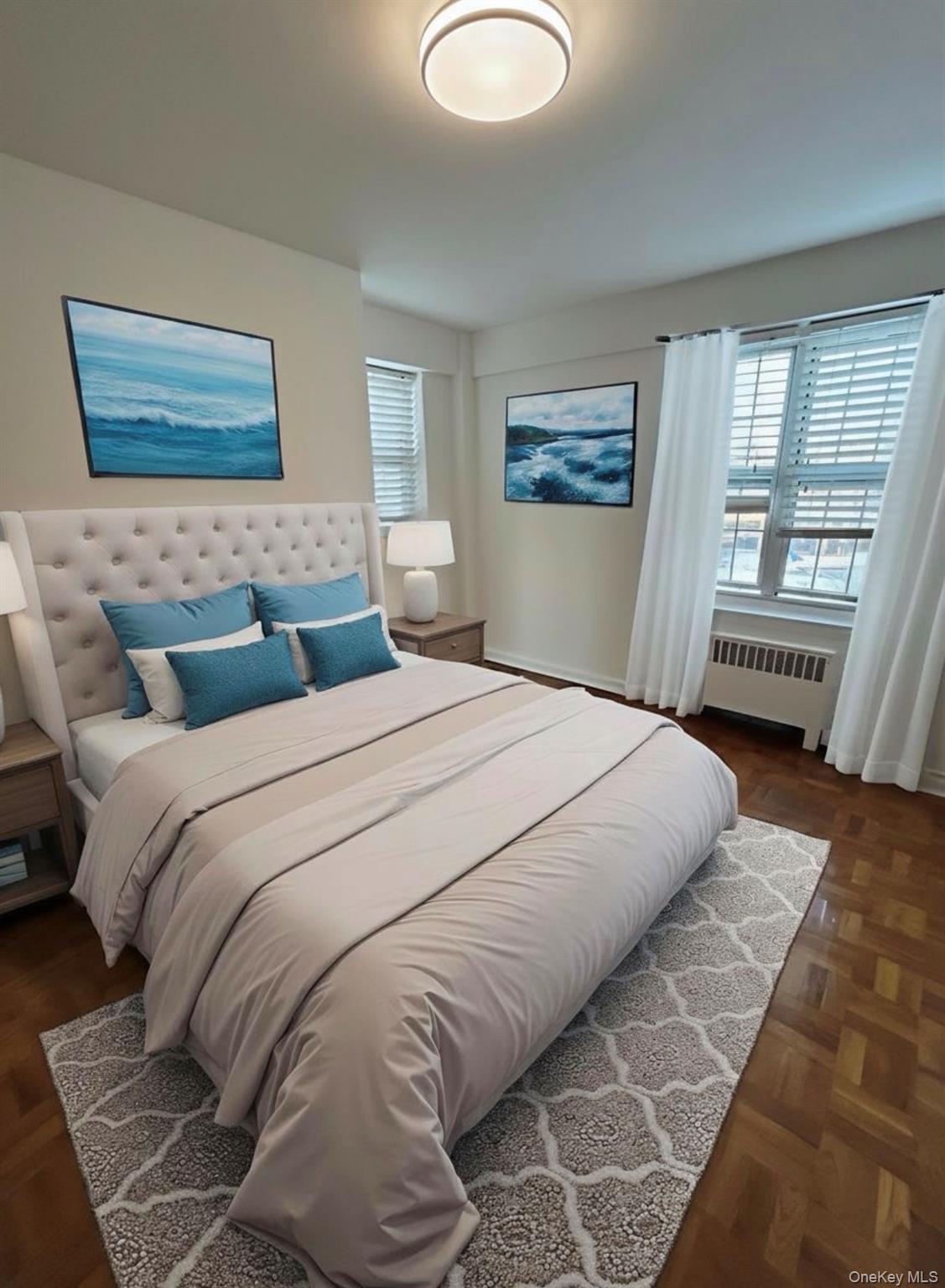 210 Pelham Road, Unit 5P New Rochelle, NY 10805 - Photo 9 of 25 a bedroom with a large bed and a window