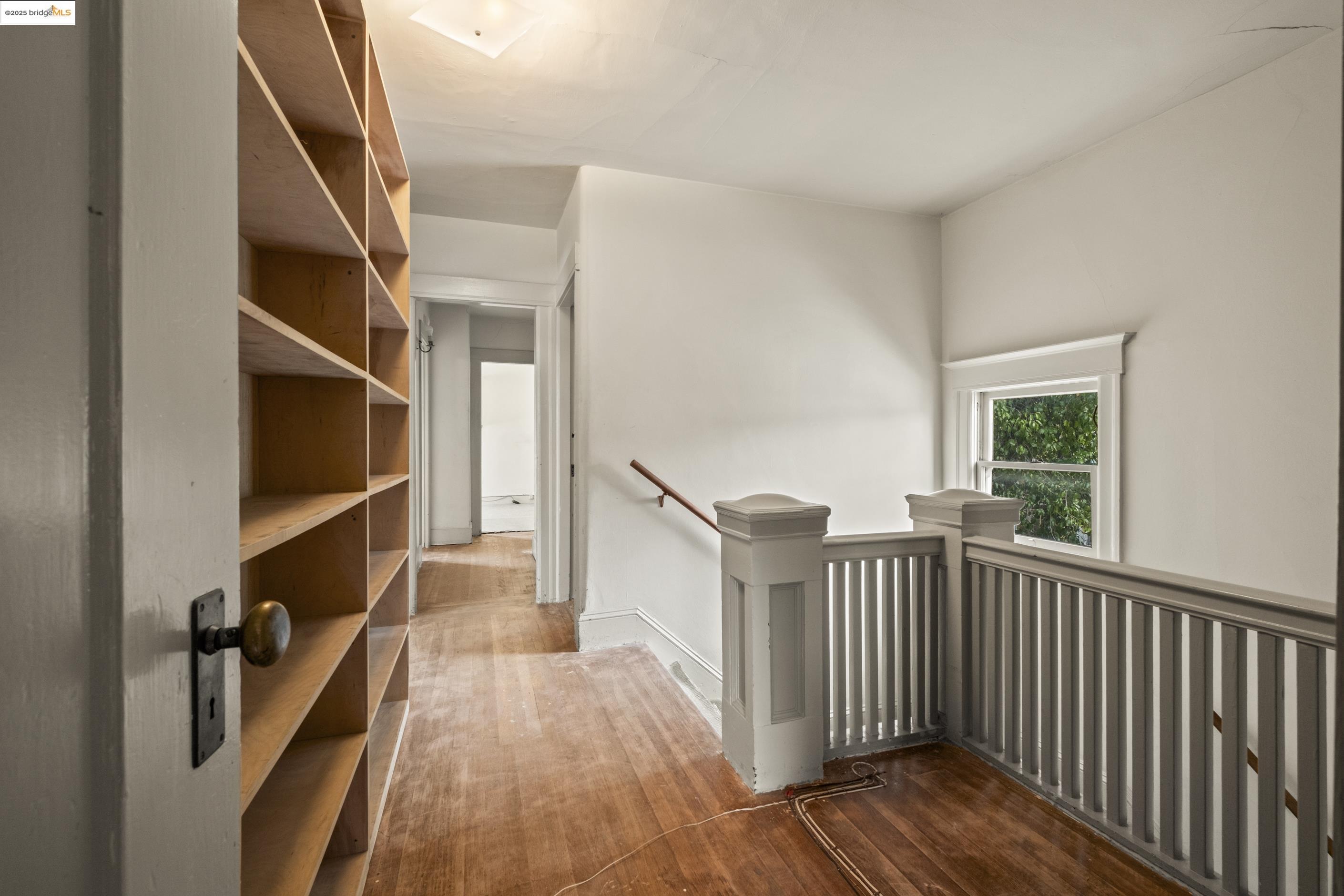 3050 Shattuck Avenue Berkeley, CA 94705 - Photo 17 of 41 a view of entryway with wooden floor and stairs