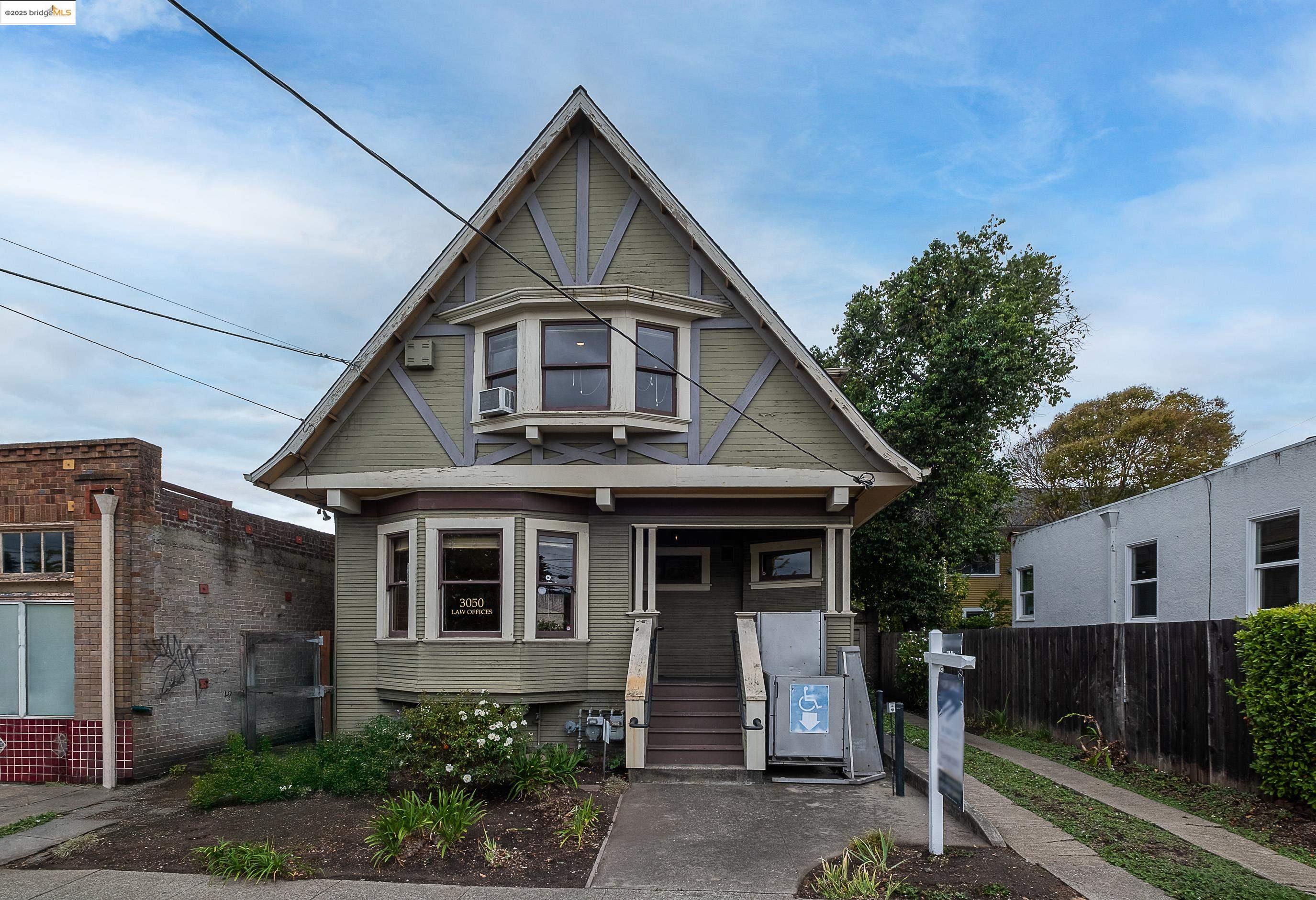 3050 Shattuck Avenue Berkeley, CA 94705 - Photo 2 of 41 a front view of a house with a yard