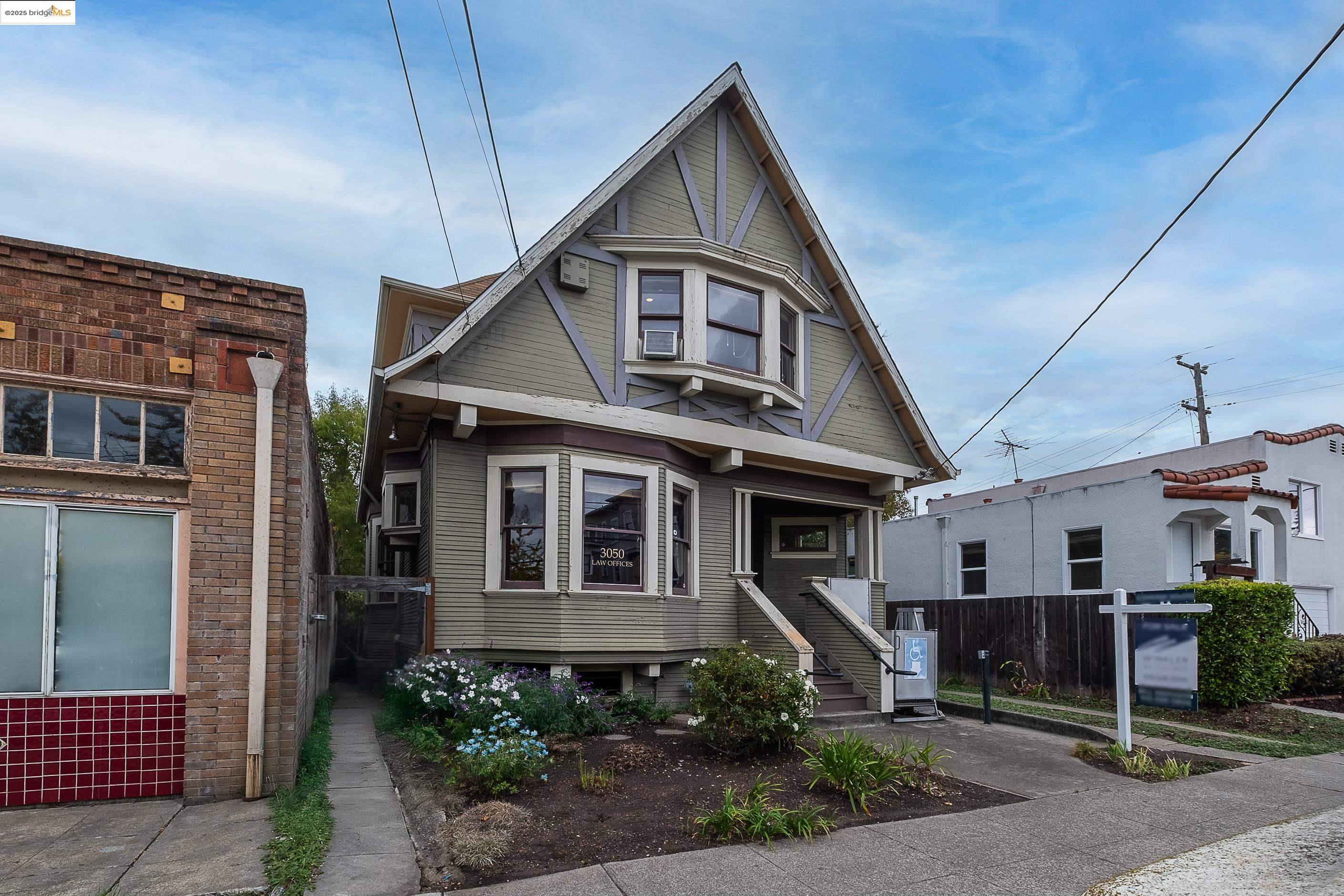 3050 Shattuck Avenue Berkeley, CA 94705 - Photo 3 of 41 a front view of a house with a yard