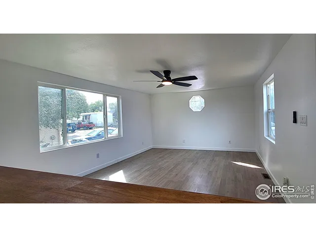 a black and white photo of a living room