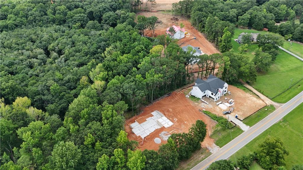1684 Kilcrease Road Bethlehem, GA 30620 - Photo 5 of 23 an aerial view of a house with garden space