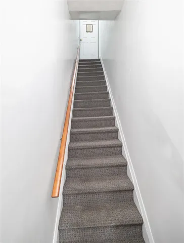 a view of a bathroom with a glass door