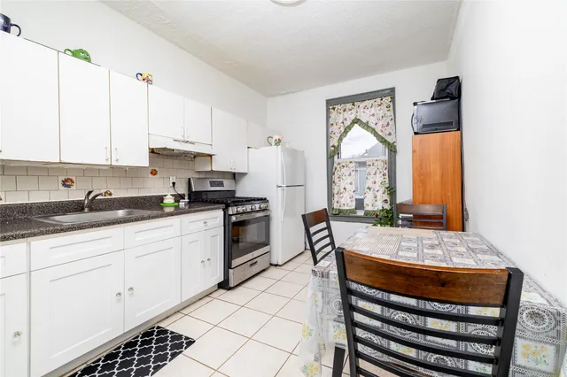 a room with furniture and a flat screen tv