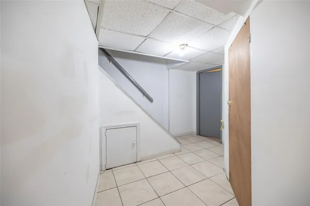 a kitchen with sink cabinets and stainless steel appliances