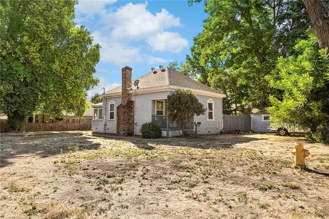 a view of a balcony with chairs