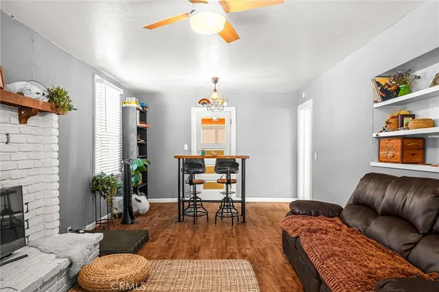 a bedroom with furniture and a fireplace