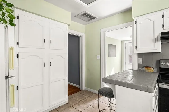 a view of a workspace with furniture and bedroom