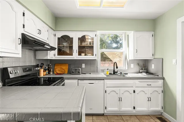 a room with furniture and wooden floor