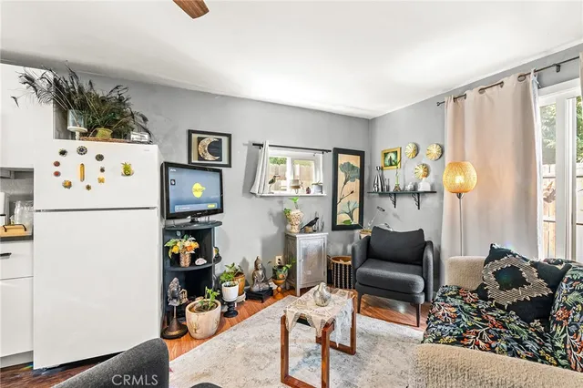a wooden fence with trees in the background