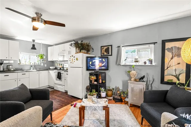 a view of wooden fence and a yard