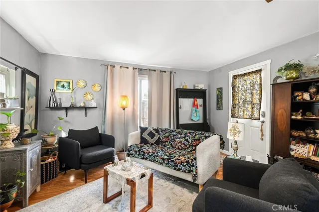 a view of a chairs and table in backyard