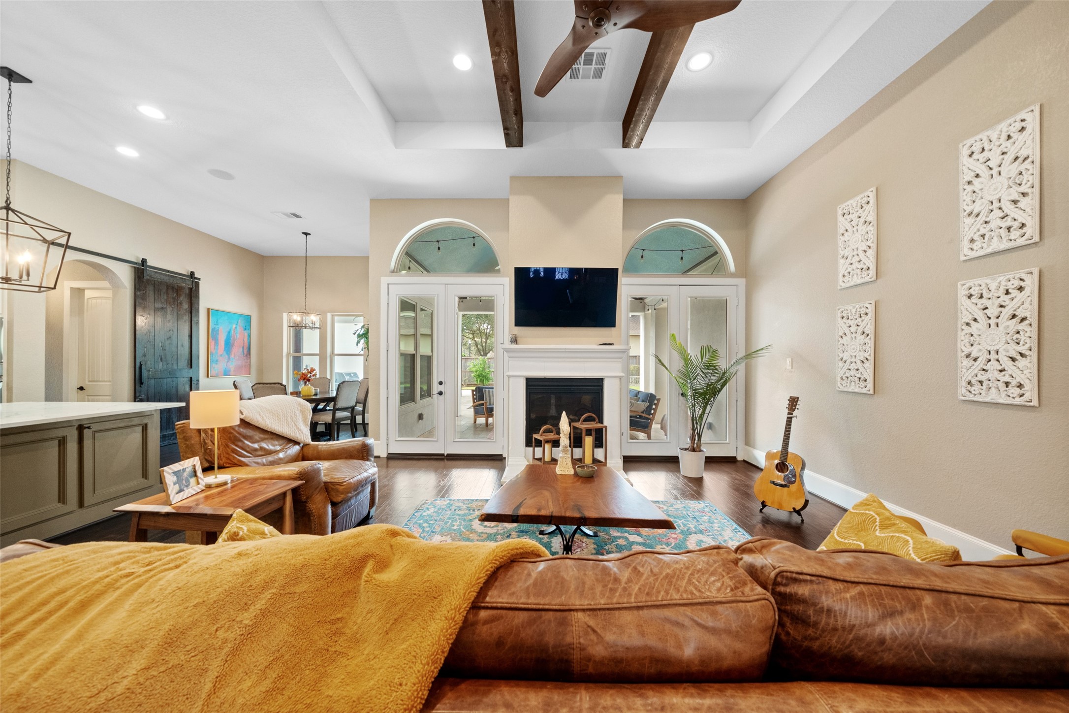 1702 Hunters Trail Friendswood, TX 77546 - Photo 20 of 42 a living room with furniture fireplace and flat screen tv