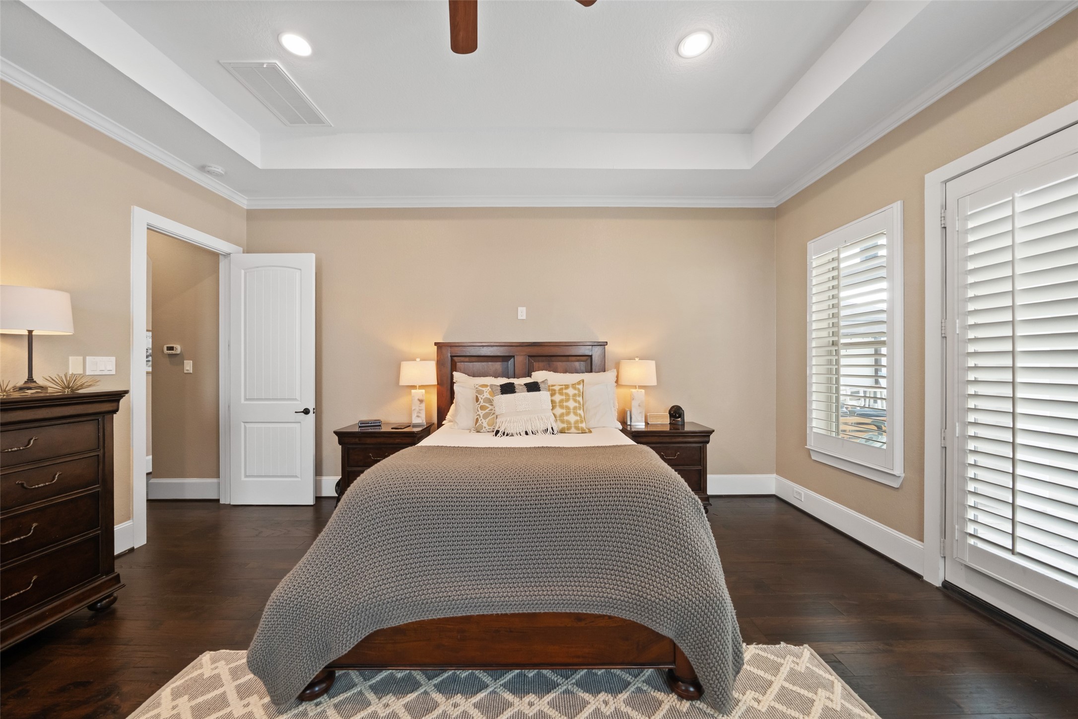 1702 Hunters Trail Friendswood, TX 77546 - Photo 23 of 42 a spacious bedroom with a bed and wooden floor