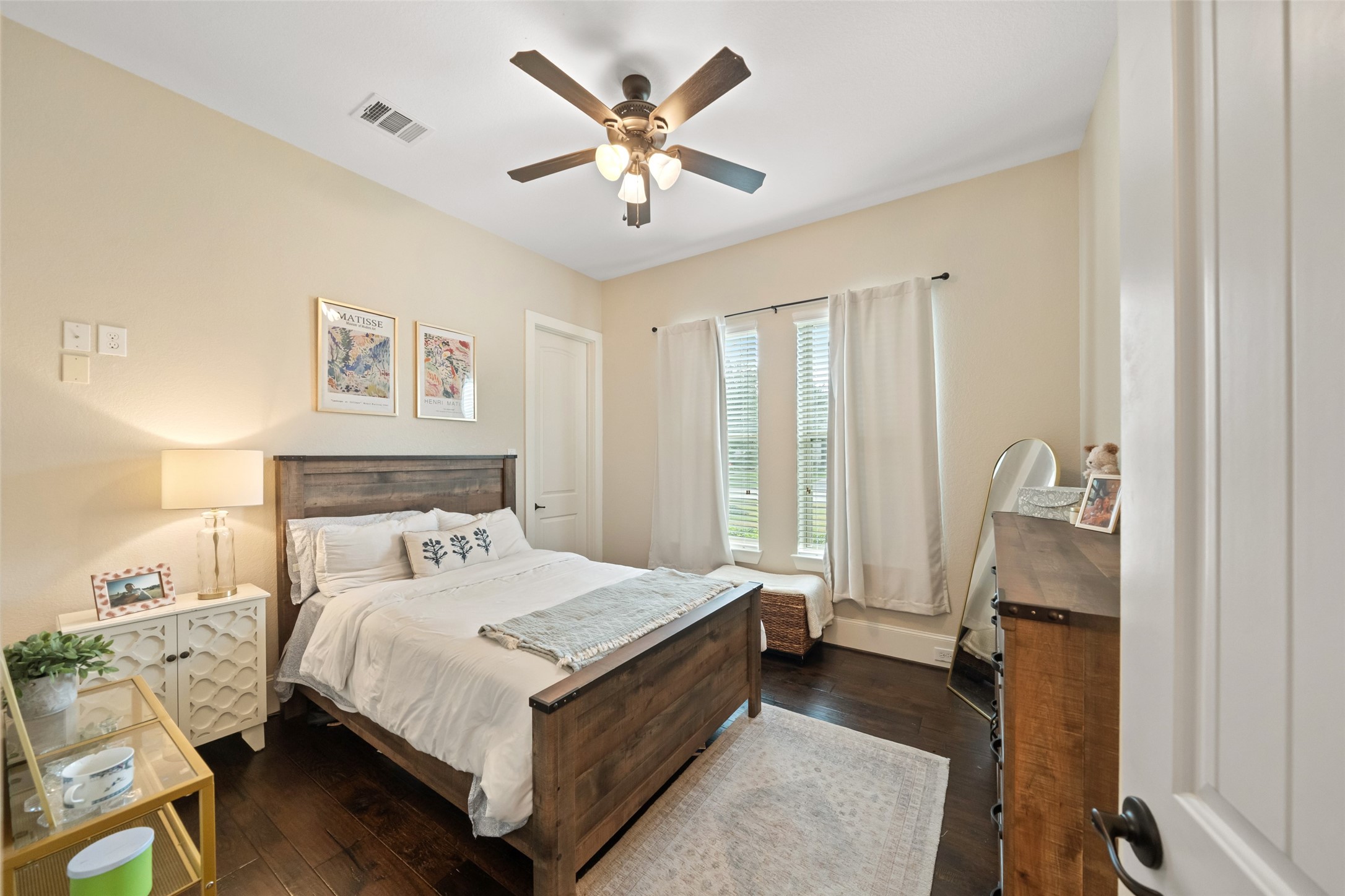 1702 Hunters Trail Friendswood, TX 77546 - Photo 29 of 42 a bed room with a bed and a chandelier