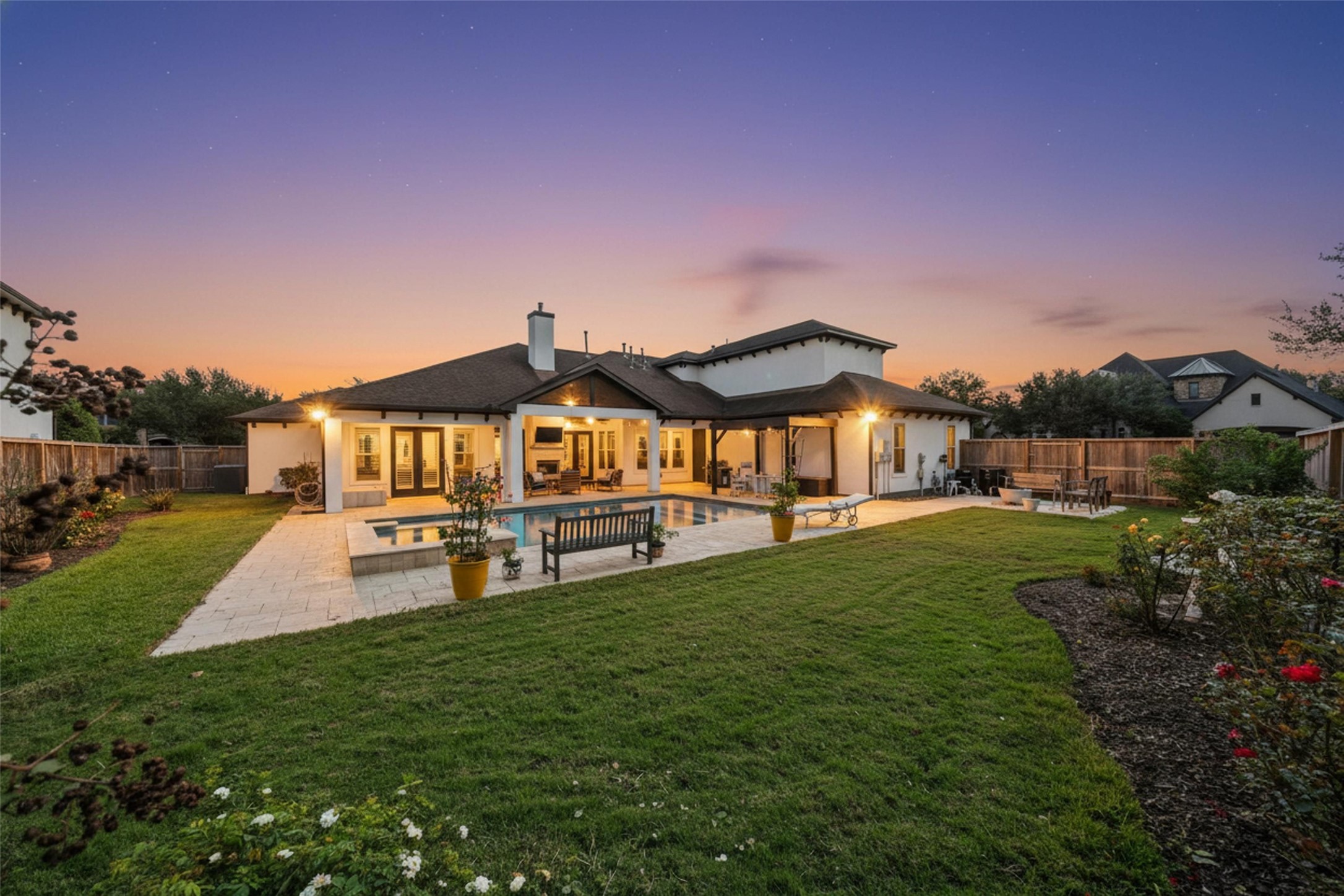 1702 Hunters Trail Friendswood, TX 77546 - Photo 3 of 42 a view of a house with a big yard potted plants and large tree