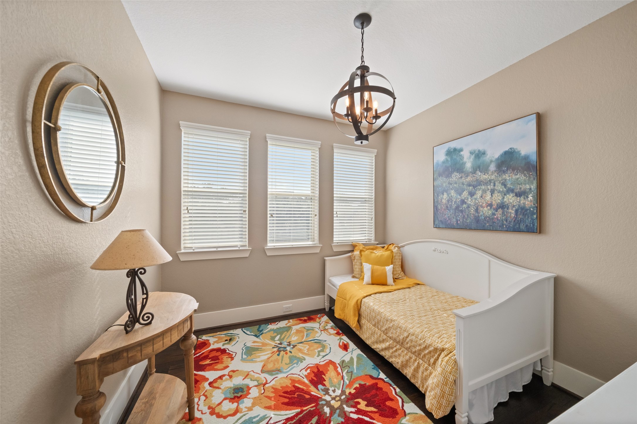 1702 Hunters Trail Friendswood, TX 77546 - Photo 34 of 42 a bedroom with a bed mirror and window