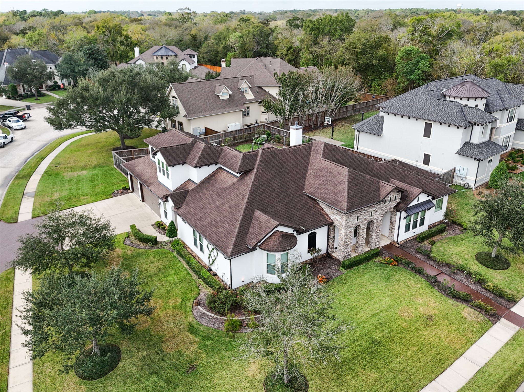 1702 Hunters Trail Friendswood, TX 77546 - Photo 4 of 42 an aerial view of a house with garden space and street view