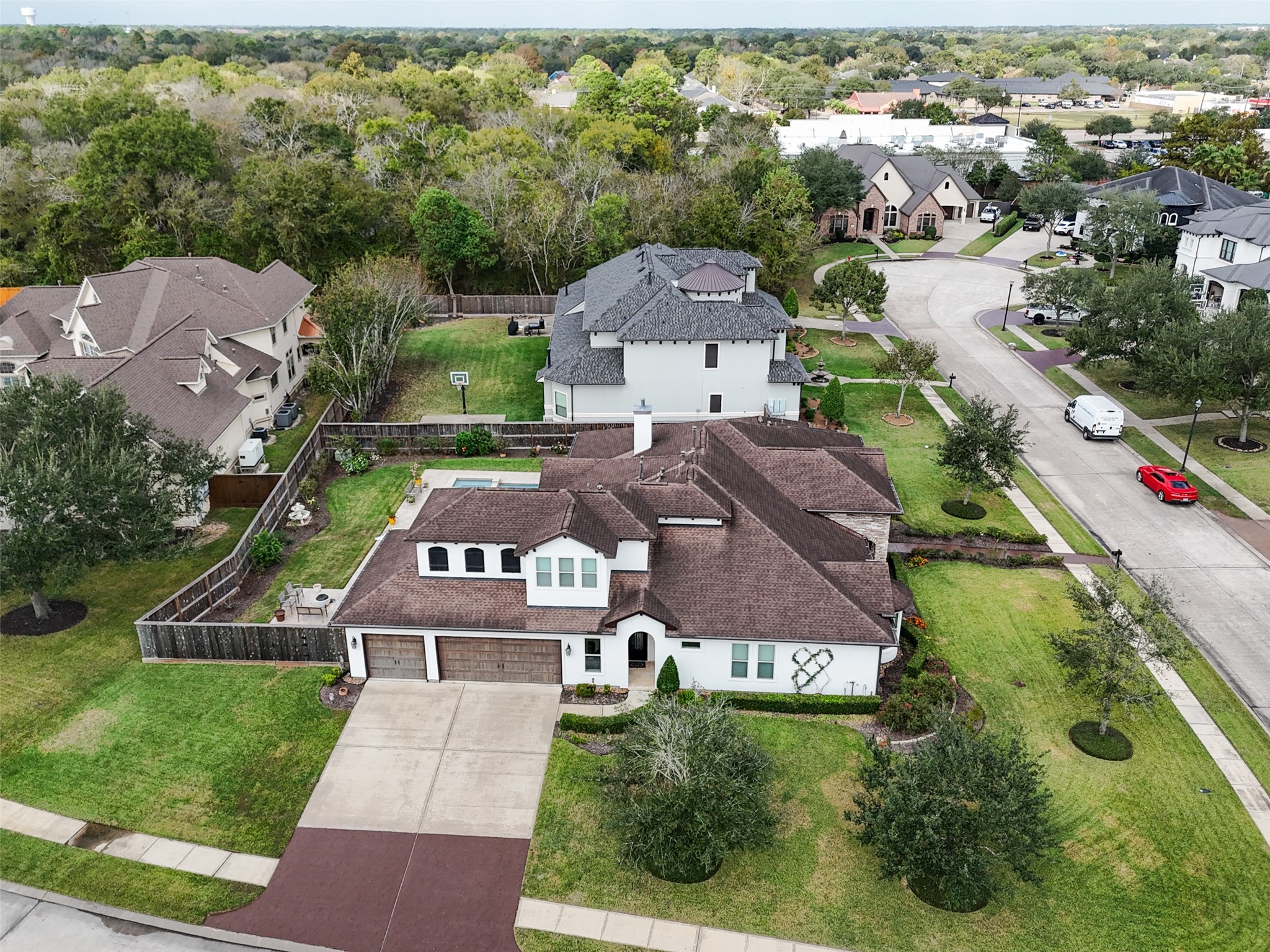 1702 Hunters Trail Friendswood, TX 77546 - Photo 6 of 42 an aerial view of residential houses with outdoor space and street view