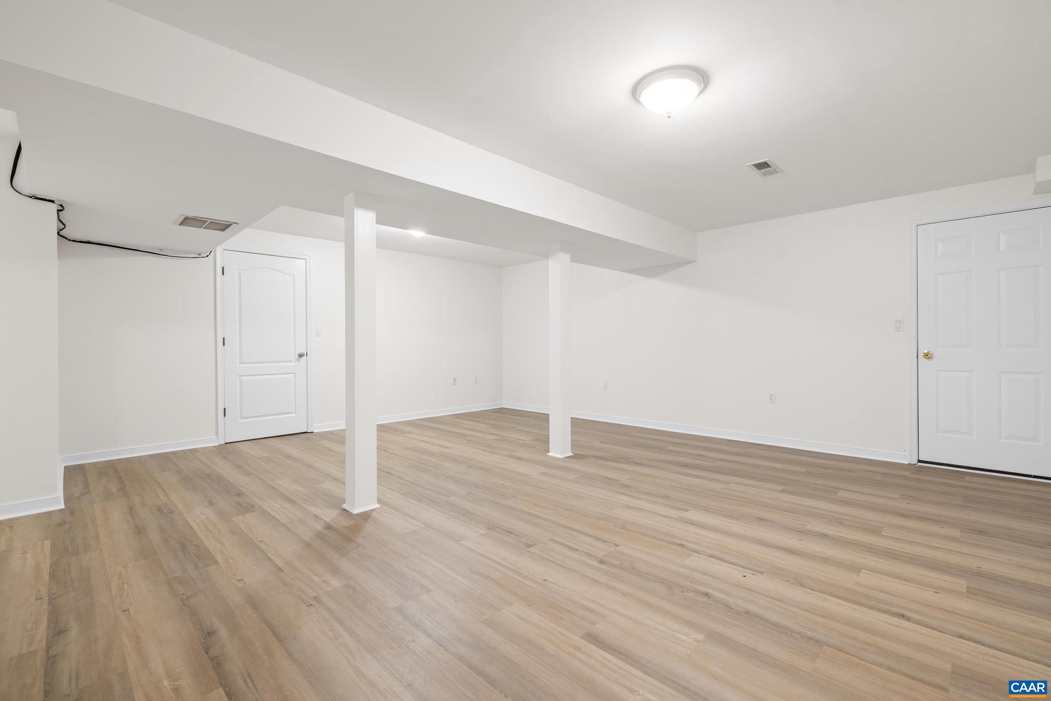 1075 Social Hall Road New Canton, VA 23123 - Photo 12 of 64 a view of an empty room with wooden floor