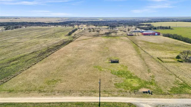 a view of a swimming pool and an outdoor space