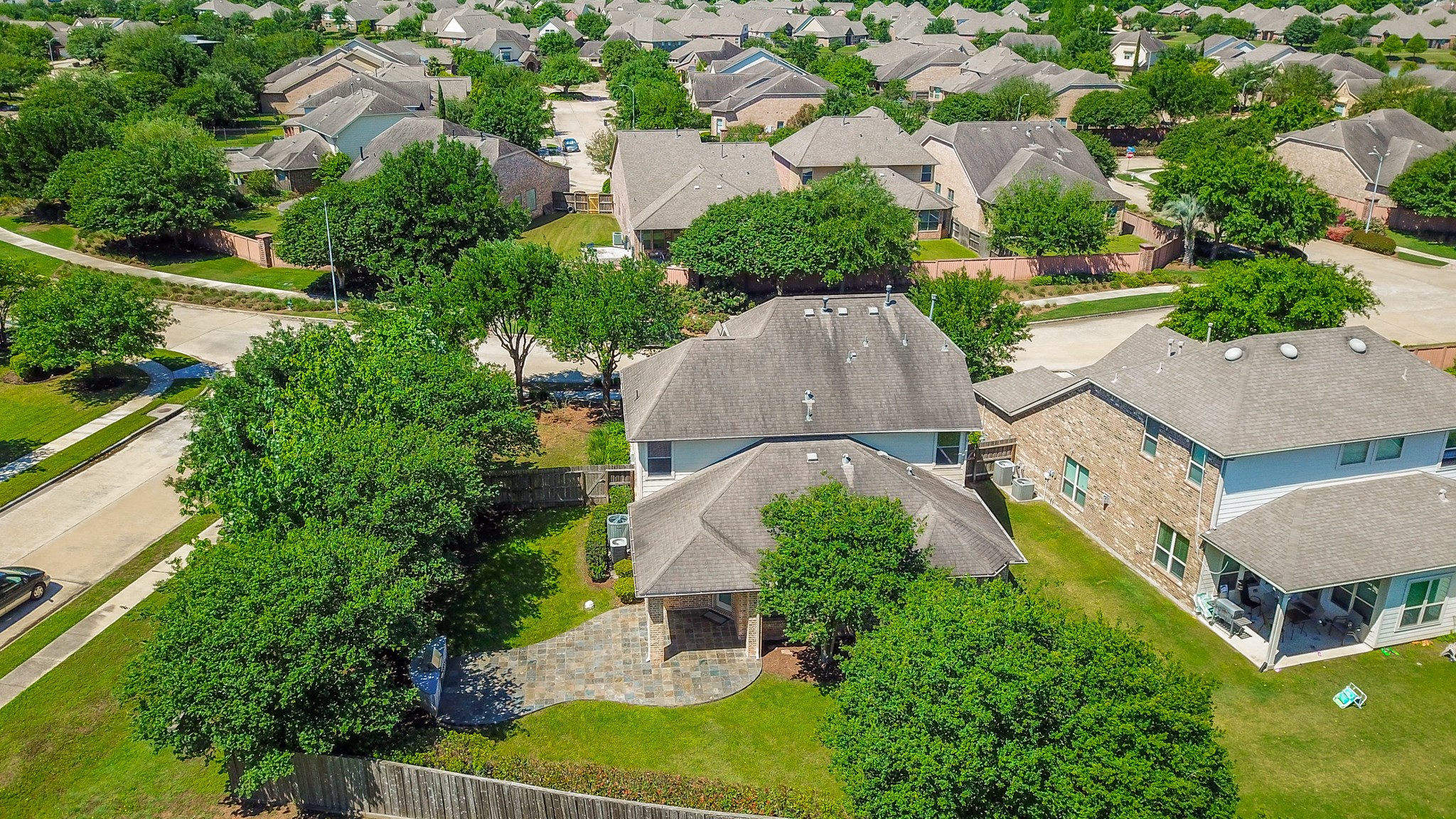 2335 Ralston Branch Way Sugar Land, TX 77479 - Photo 1 of 47 an aerial view of multiple houses with yard