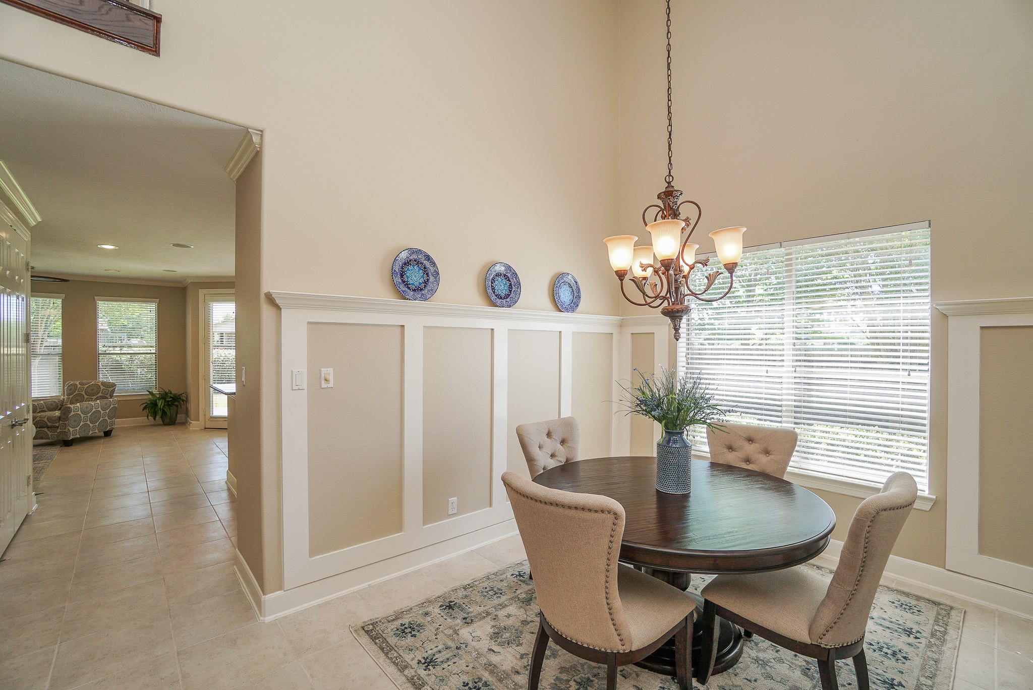 2335 Ralston Branch Way Sugar Land, TX 77479 - Photo 11 of 47 a view of a dining room with furniture and chandelier