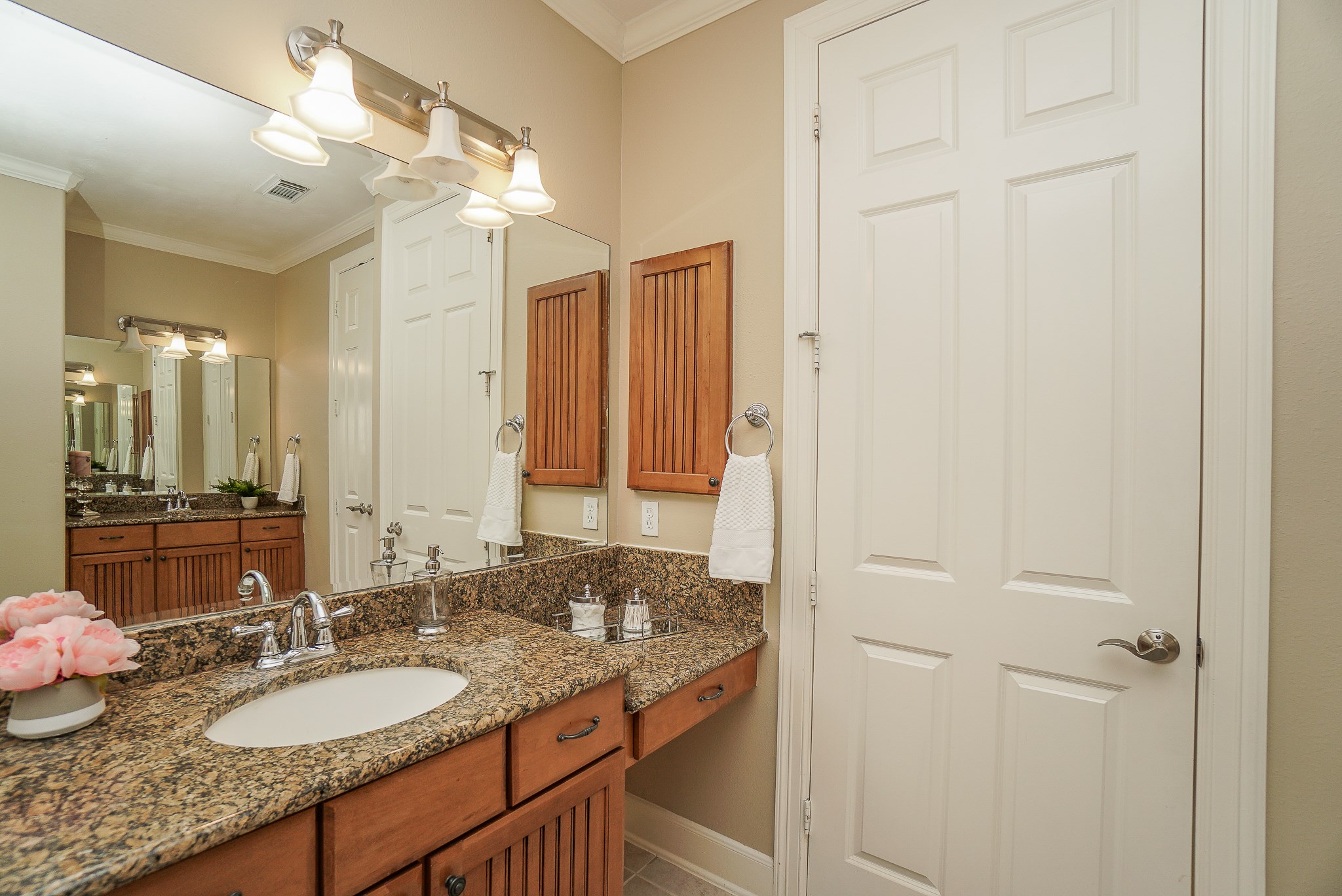 2335 Ralston Branch Way Sugar Land, TX 77479 - Photo 28 of 47 a bathroom with a granite countertop sink and a mirror