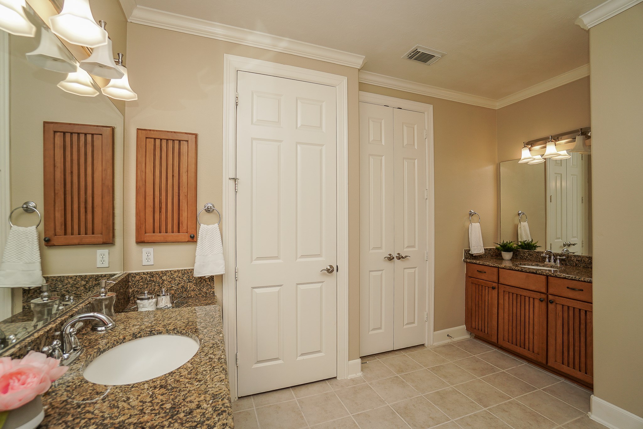 2335 Ralston Branch Way Sugar Land, TX 77479 - Photo 29 of 47 a bathroom with a sink double vanity granite tub shower a mirror and a sink