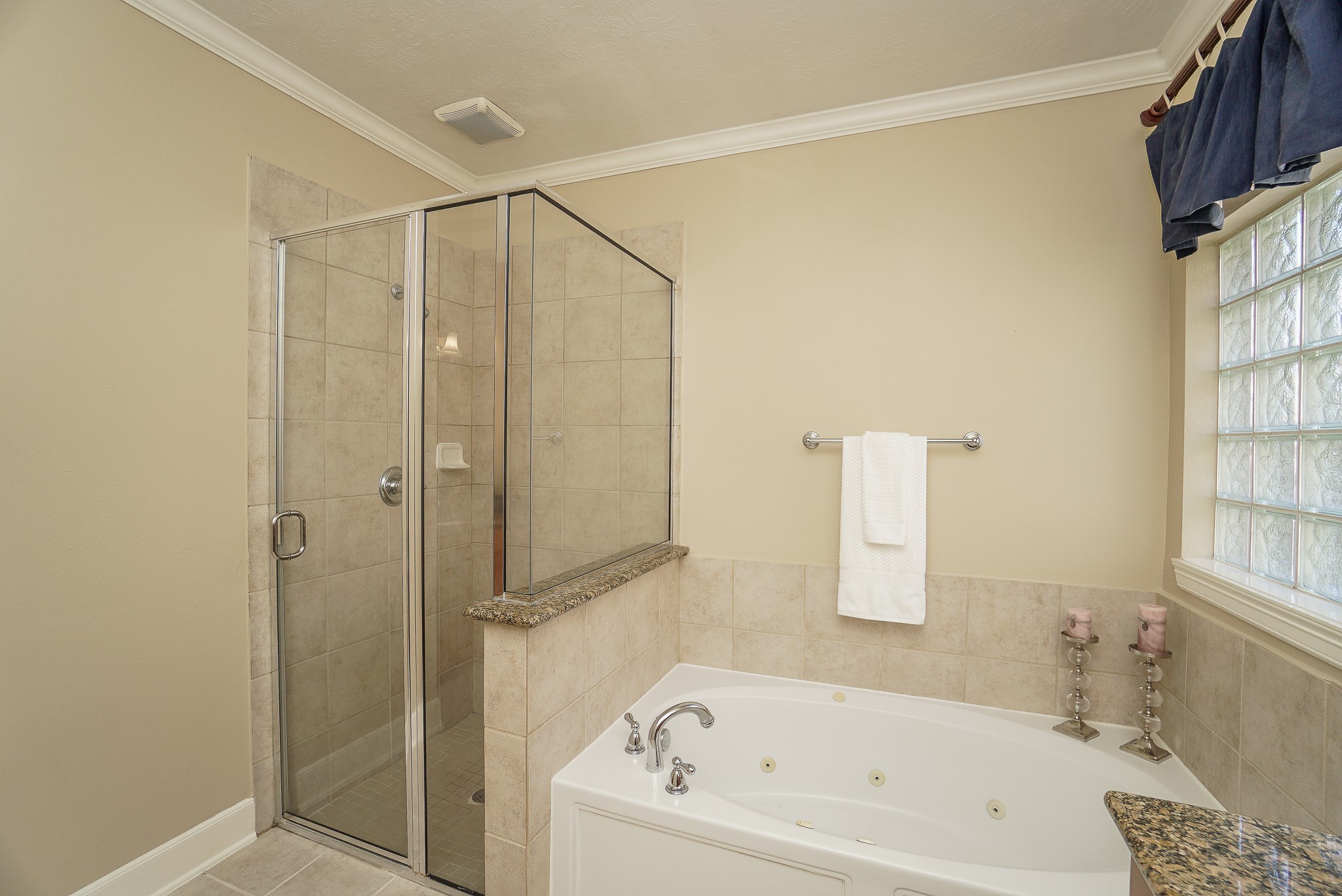 2335 Ralston Branch Way Sugar Land, TX 77479 - Photo 30 of 47 a bathroom with a bathtub a window and a shower