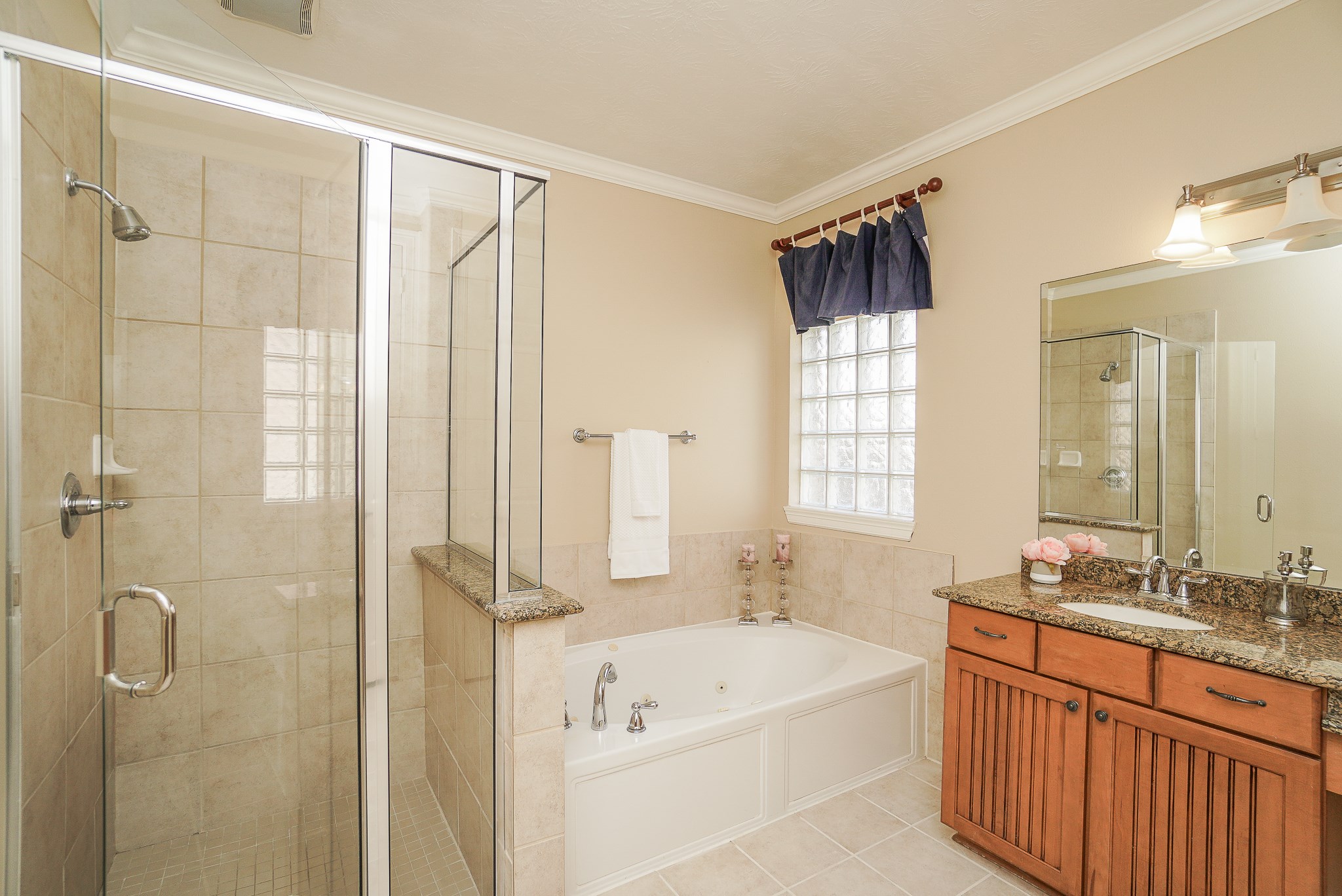 2335 Ralston Branch Way Sugar Land, TX 77479 - Photo 31 of 47 a bathroom with a tub sink and mirror
