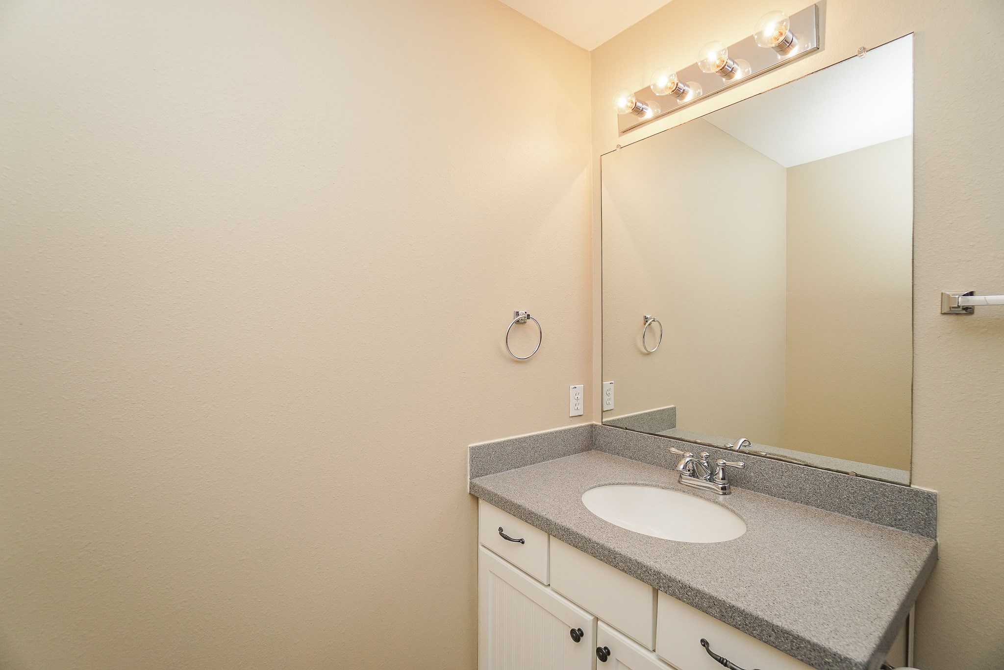 2335 Ralston Branch Way Sugar Land, TX 77479 - Photo 37 of 47 a bathroom with a granite countertop sink and a mirror