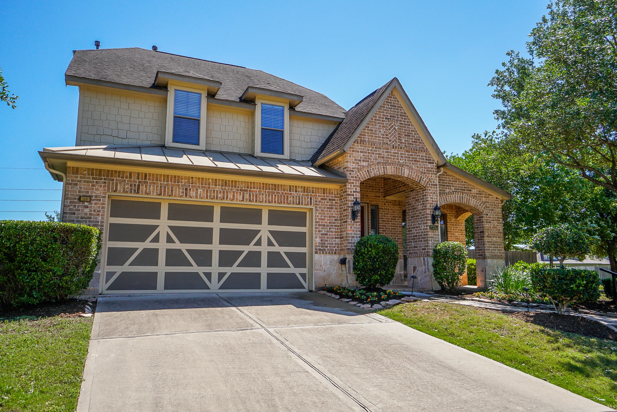 2335 Ralston Branch Way Sugar Land, TX 77479 - Photo 4 of 47 front view of a house with a yard