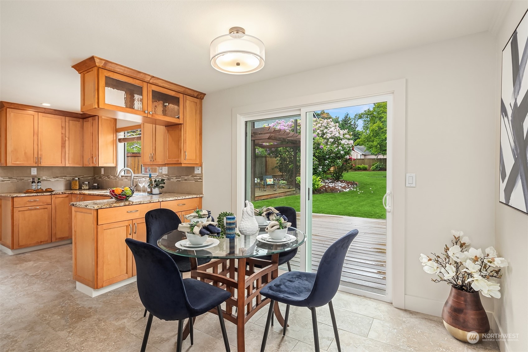 1909 Northeast 24th Street Renton, WA 98056 - Photo 12 of 34 a view of a dining room with furniture window and outside view