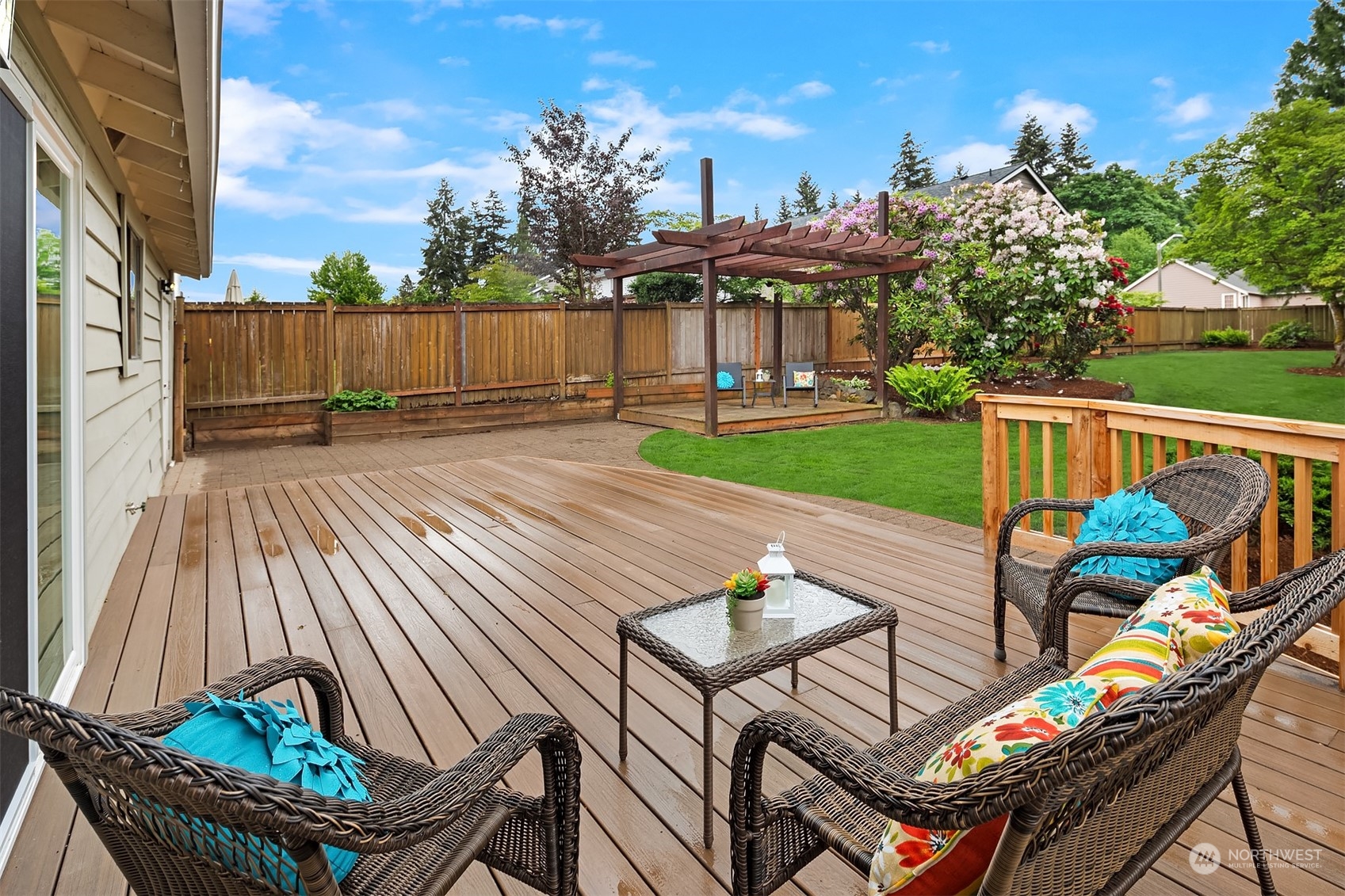 1909 Northeast 24th Street Renton, WA 98056 - Photo 14 of 34 a view of a patio with iron fence