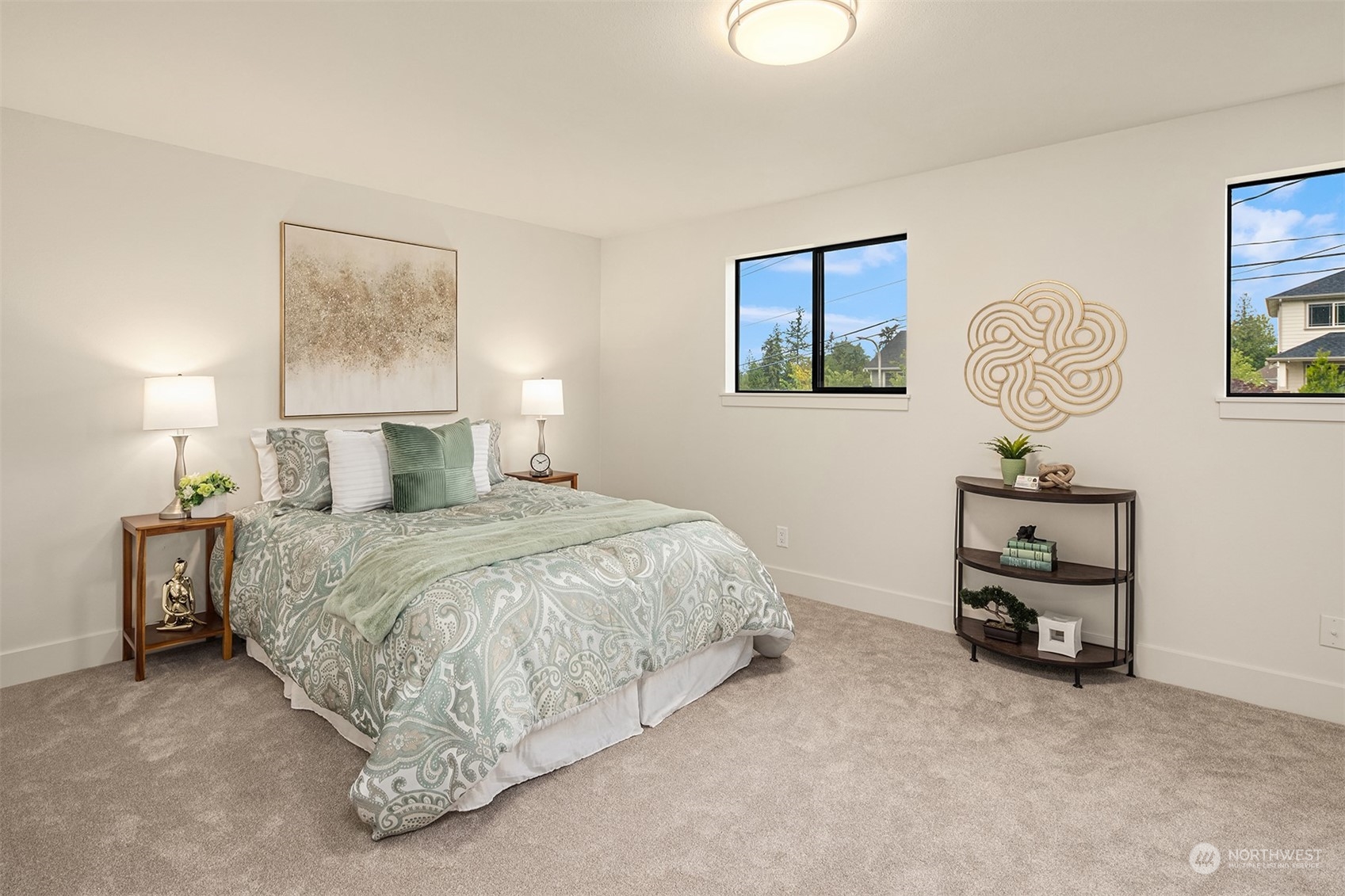 1909 Northeast 24th Street Renton, WA 98056 - Photo 15 of 34 a bedroom with a bed and a painting on the wall
