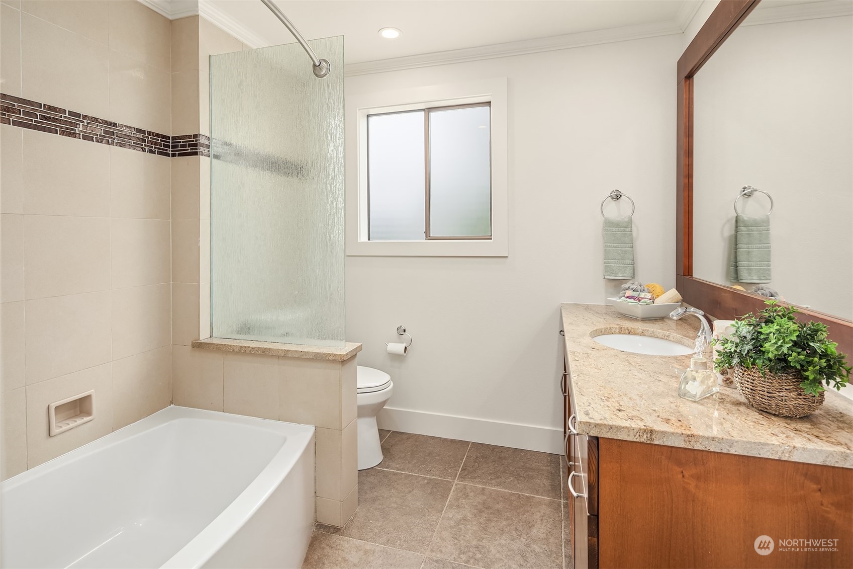 1909 Northeast 24th Street Renton, WA 98056 - Photo 17 of 34 a bathroom with a sink a toilet and shower