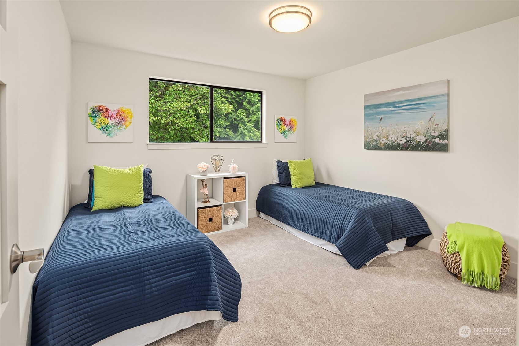 1909 Northeast 24th Street Renton, WA 98056 - Photo 18 of 34 a bedroom with a bed and a painting on the wall