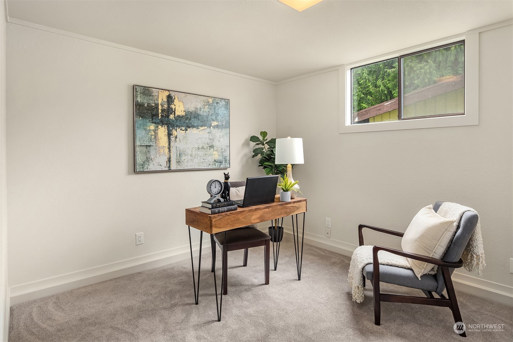 1909 Northeast 24th Street Renton, WA 98056 - Photo 19 of 34 a workspace with furniture and a window