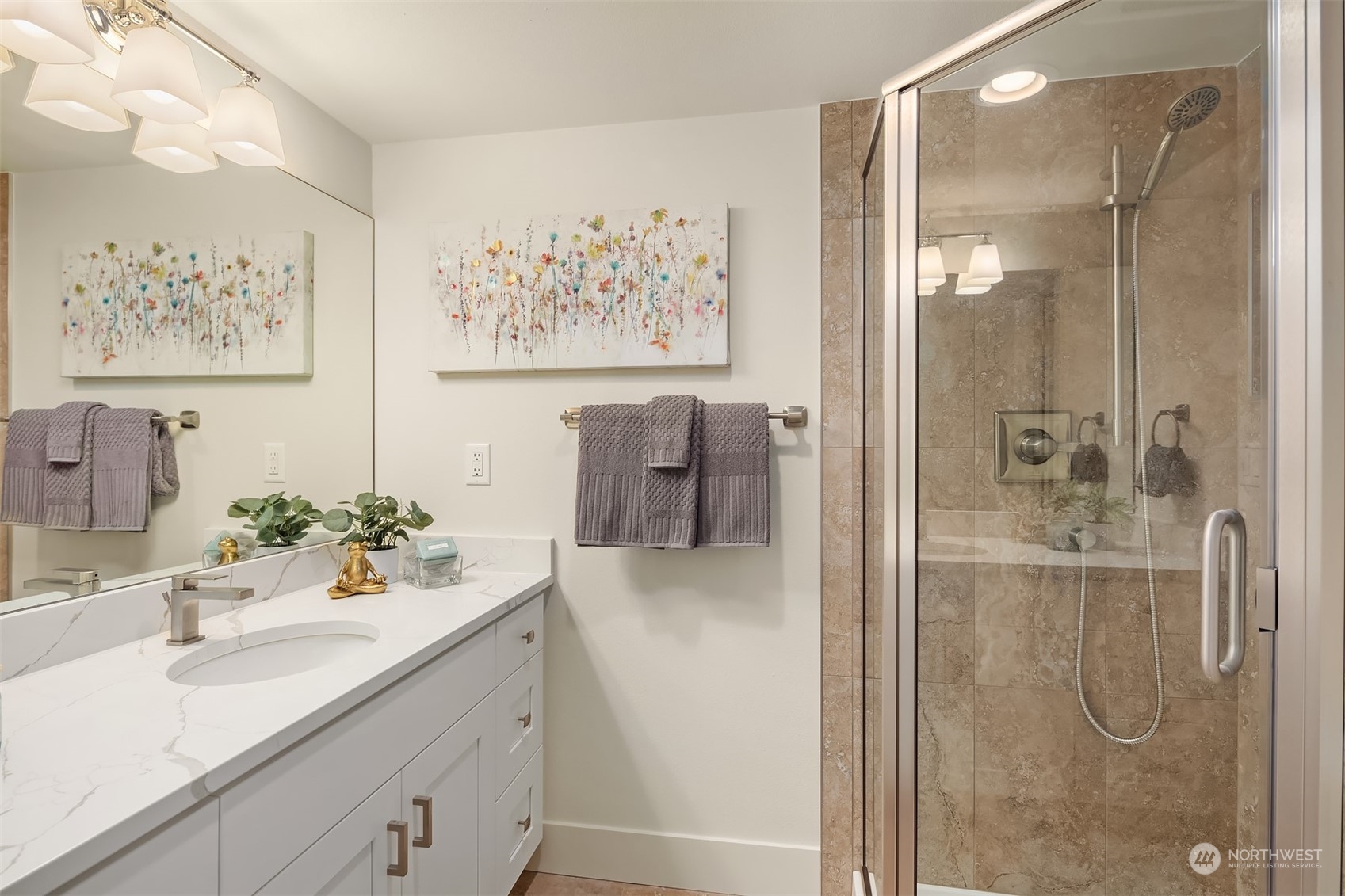1909 Northeast 24th Street Renton, WA 98056 - Photo 20 of 34 a bathroom with a sink mirror and a shower