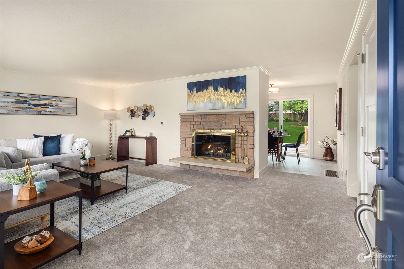 1909 Northeast 24th Street Renton, WA 98056 - Photo 2 of 34 a living room with furniture and a fireplace