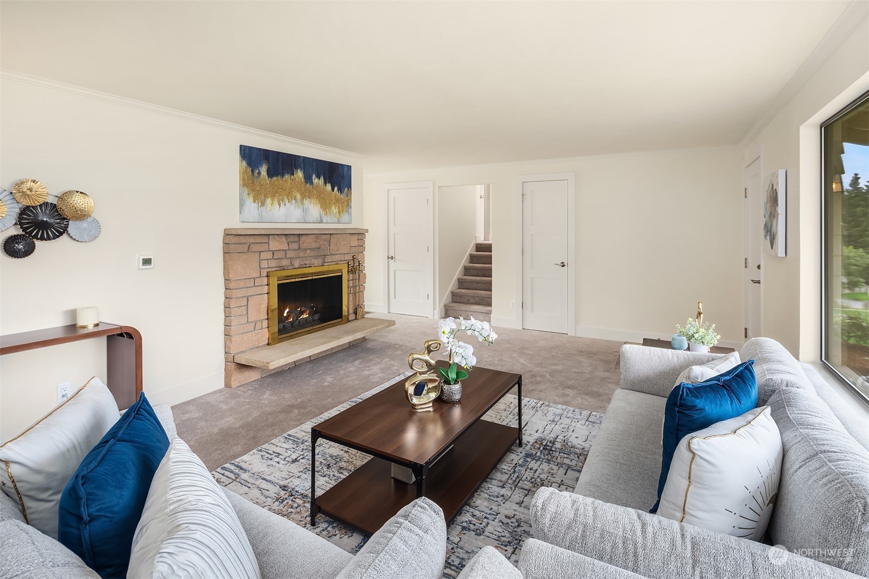 1909 Northeast 24th Street Renton, WA 98056 - Photo 4 of 34 a living room with furniture and a fireplace