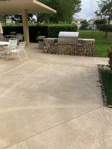 a view of a entryway door with wooden floor