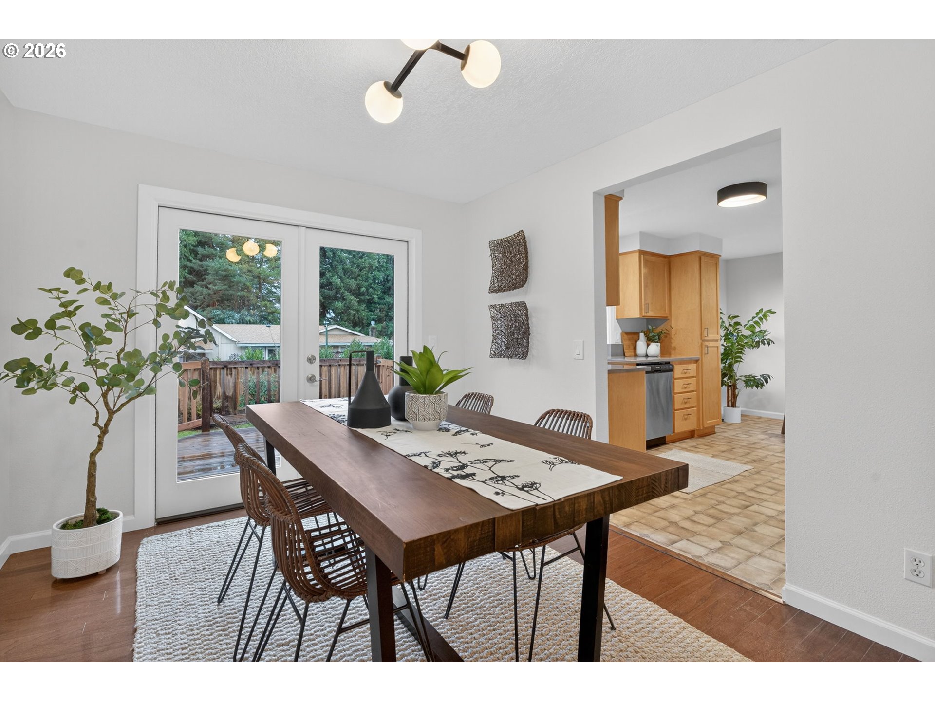 5690 Southwest 203rd Avenue Beaverton, OR 97078 - Photo 7 of 19 a view of a dining room with furniture window and outside view