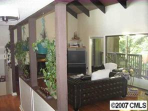 4723 Rounding Run Road, Unit 4723 Charlotte, NC 28277 - Photo 3 of 8 a living room with furniture