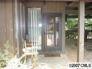 4723 Rounding Run Road, Unit 4723 Charlotte, NC 28277 - Photo 7 of 8 a view of a glass door with a yard