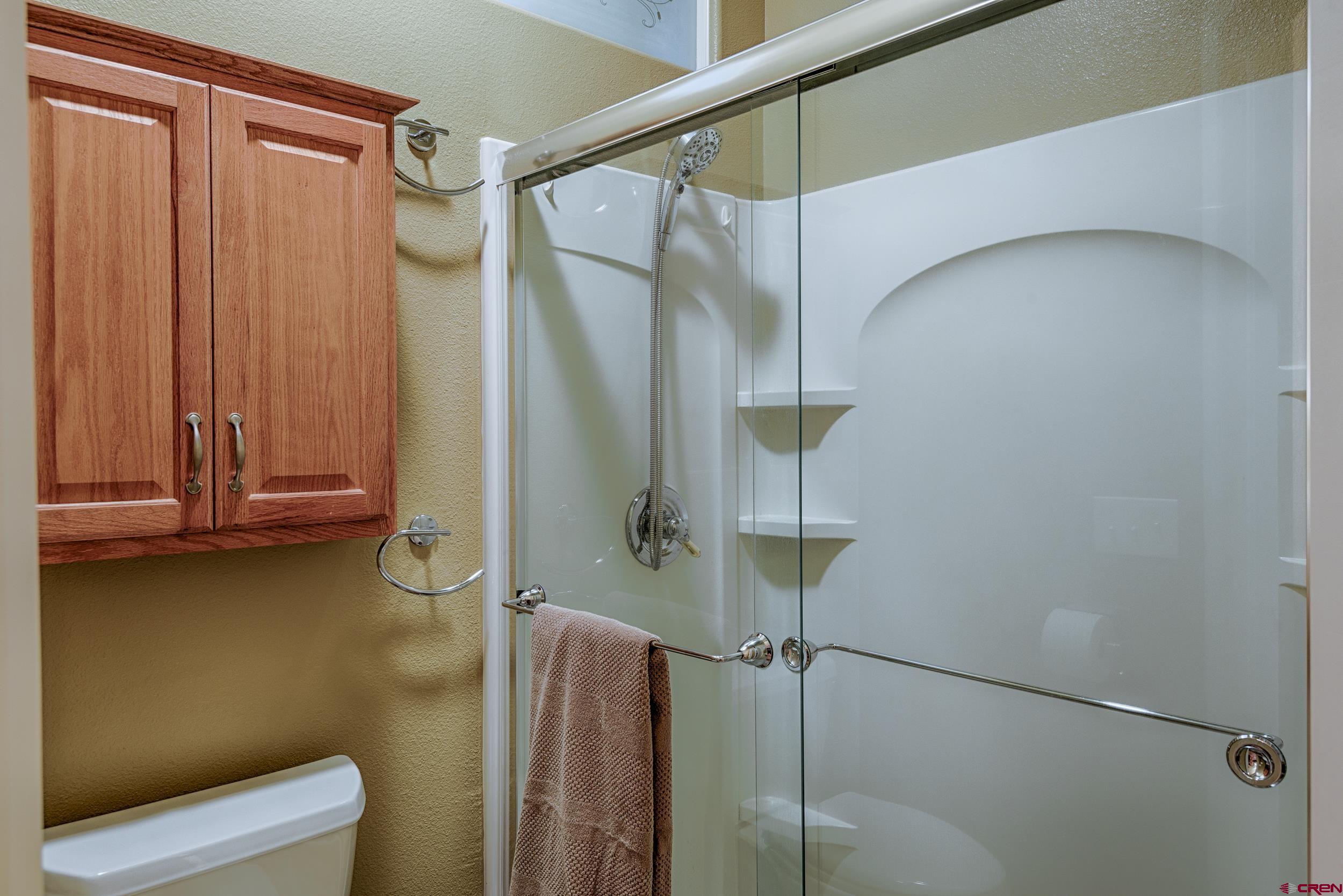 61928 Jay Jay Road Montrose, CO 81401 - Photo 24 of 36 a bathroom with a shower